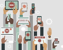 An illustration of many hands of different skin tones all holding cell phones or tablet computers displaying information about covid-19.