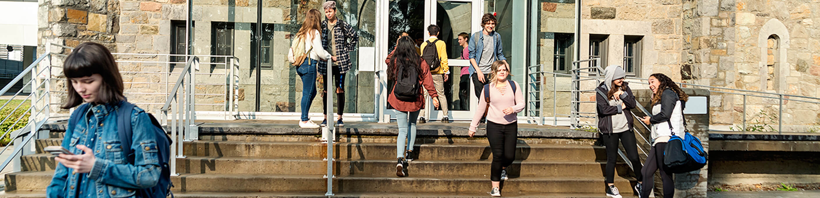 University building with students on steps